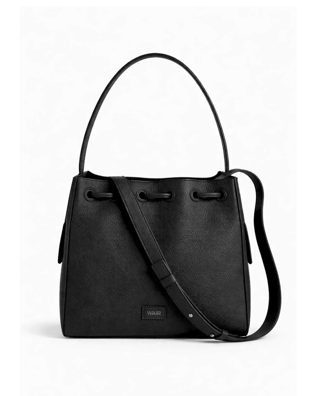 The Cove in onyx leather, side profile — the silhouette resolved before any painted mark.